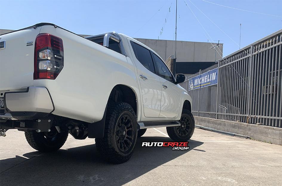 MITSUBISHI TRITON VAPOR BLACK MACHINED WITH DARK TINT
